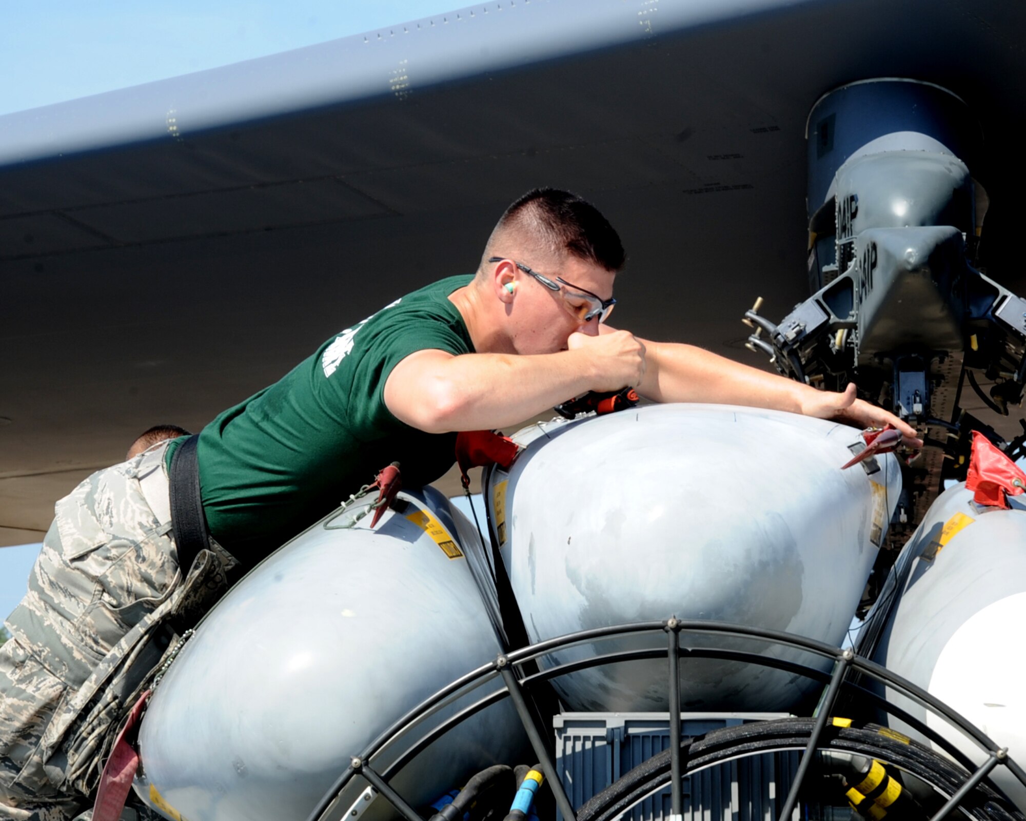 Staff Sgt. Caleb Nolen, 2nd Aircraft Maintenance Squadron weapons load team chief, inspects an AGM-86 Air Launch Cruise Missile during the 2014 Global Strike Challenge on Barksdale Air Force Base, La., Aug. 26.  The objective of the competition is to demonstrate bomber maintenance procedures and enhance esprit de corps by recognizing crew, team, individual and unit professionalism. (U.S. Air Force photo/Staff Sgt. Sean Martin)





