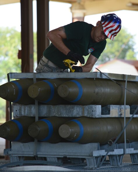 Staff Sgt. Joshua Hayden, 2nd Munitions Squadron build team, prepares GBU-38 bombs for building during the 2014 Global Strike Challenge on Barksdale Air Force Base, La., Aug. 26. Global Strike Challenge is the world's premier bomber, Intercontinental Ballistic Missile, helicopter operations and security forces competition with units from Air Force Global Strike Command, Air Combat Command, Air Force Reserve Command and the Air National Guard. (U.S. Air Force photo/Senior Airman Benjamin Gonsier)