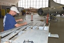 DAYTON, Ohio (08/2014) -- Restoration specialist Duane Jones works on the B-17F &quot;Memphis Belle&quot; in the restoration hangar at the National Museum of the U.S. Air Force. (U.S. Air Force photo)