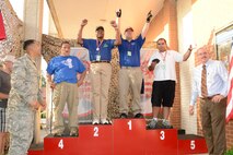 High scorers celebrate during the awards ceremony Aug. 23 at Robins Lanes. The facility played host to the Special Olympics Georgia Master’s Bowling Tournament Aug. 22 through 24. More than 1,000 athletes, partners and coaches participated in the event which split its time between the base and the Gold Cup Bowling Center on Russell Parkway. The event included singles, unified team and ramp bowling competitions as well as health screenings for the athletes. (U.S. Air Force photo by Ed Aspera)