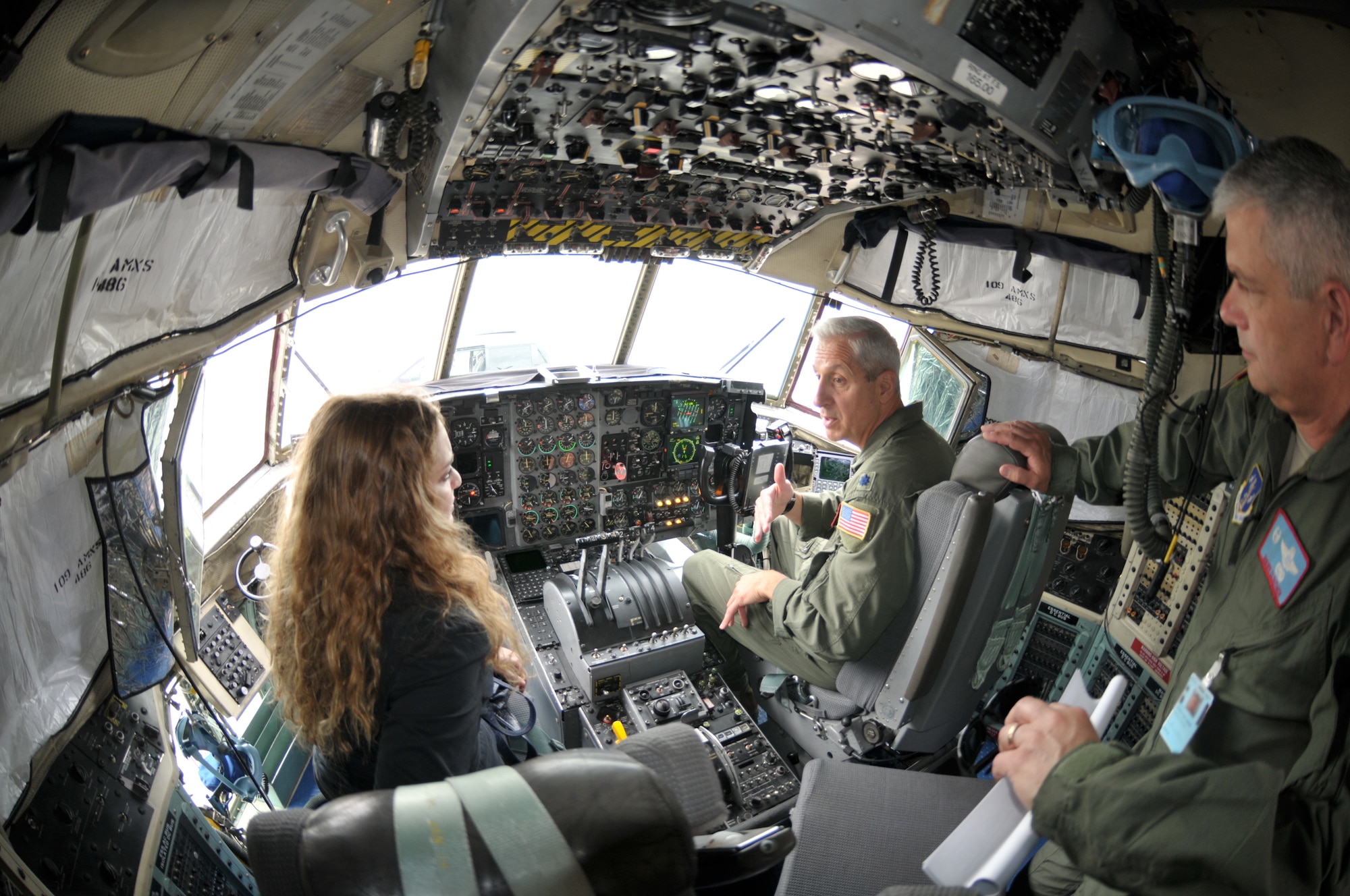 Col. Shawn Clouthier (right), 109th Airlift Wing commander, and Lt. Col. Alan Ross, 109th AW chief of staff, give Moran Banai, military legislative assistant to Sen. Kirsten Gillibrand, an inside look of an LC-130. Banai came to Stratton Air National Guard Base, Scotia, N.Y., on Aug. 27, 2014, to learn more about the 109th's unique mission and tour an LC-130 aircraft. (U.S. Air National Guard photo by Master Sgt. William Gizara/Released)