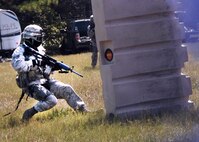 Seventy Eighth Security Forces Squadron Airmen conducted Shoot, Move and Communicate, and Combatives training at the EOD Range and fitness center annex respectively Aug. 19 and 21, 2014. During the SMC training, Airmen hone their skills on how to react. Participants go over different firing positions, fighting stances, maneuvers and communications while targeting the enemy.

Combatives training includes self defense, weapons retention, hand-to-hand combat, submission holds and non-lethal techniques and strikes. The two-part training starts in the morning with intense warm-ups and stretching, followed by basic fighting techniques, including a light sparring session with a partner to recap all of the techniques taught as it applies in use-of-force regulations. (U.S. Air Force photo by Misuzu Allen)

