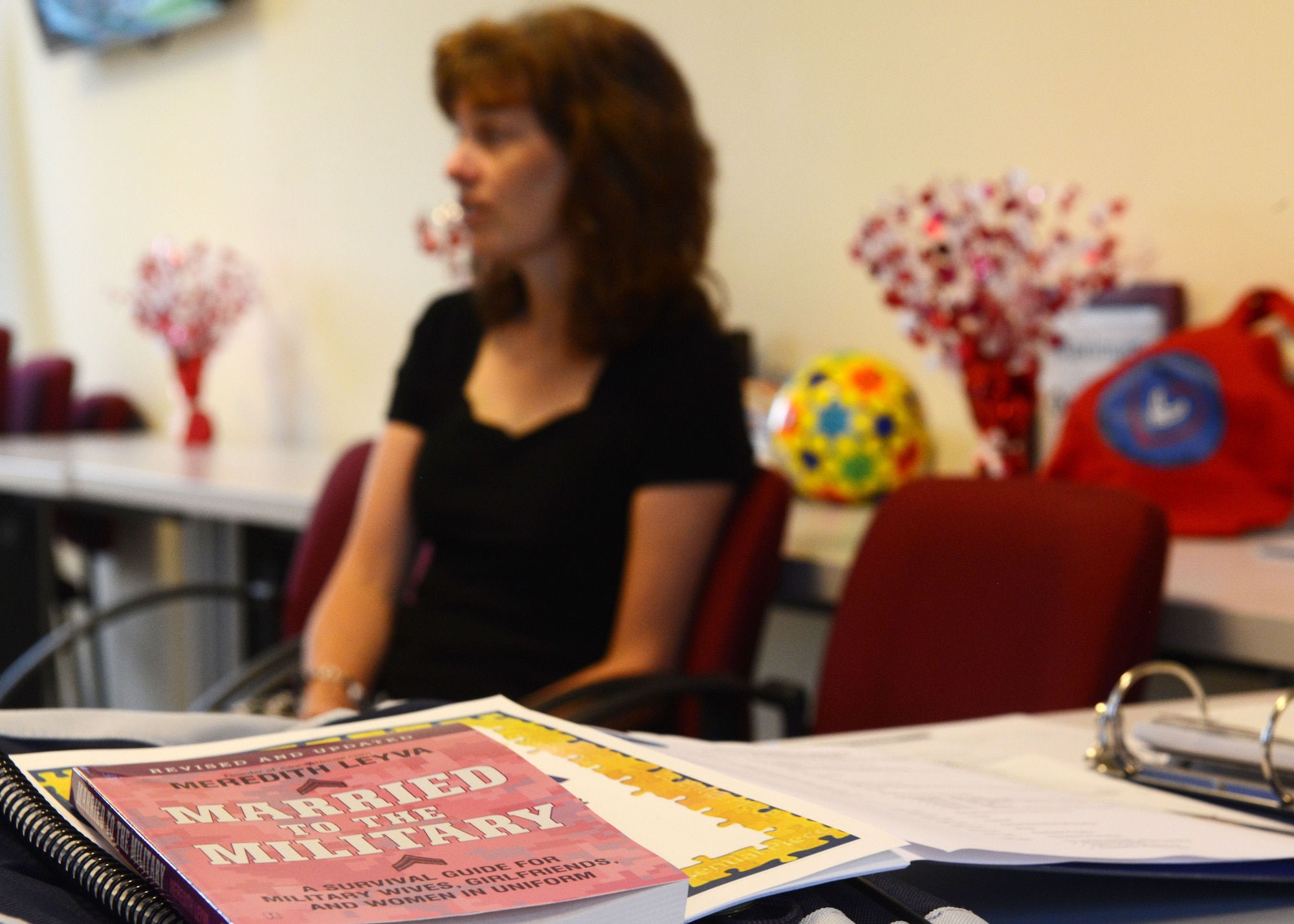 Nancy Seguin, wife of Gen. Barre Seguin, 31st Fighter Wing commander, introduces herself to newer spouses on base at “Heartlink”, Aug. 28, 201, at Aviano Air Base, Italy. Nancy Seguin spoke to a handful of spouses during an introductory course catered to spouses who have recently arrived on base called “Heartlink.” Throughout the day, the Airman and Family Readiness Center hosts briefings consisting of financial management, military personnel services, employment, legal representation, education information and other helpful hints for living in Italy. (U.S. Air Force photo/Airman 1st Class Ryan Conroy)