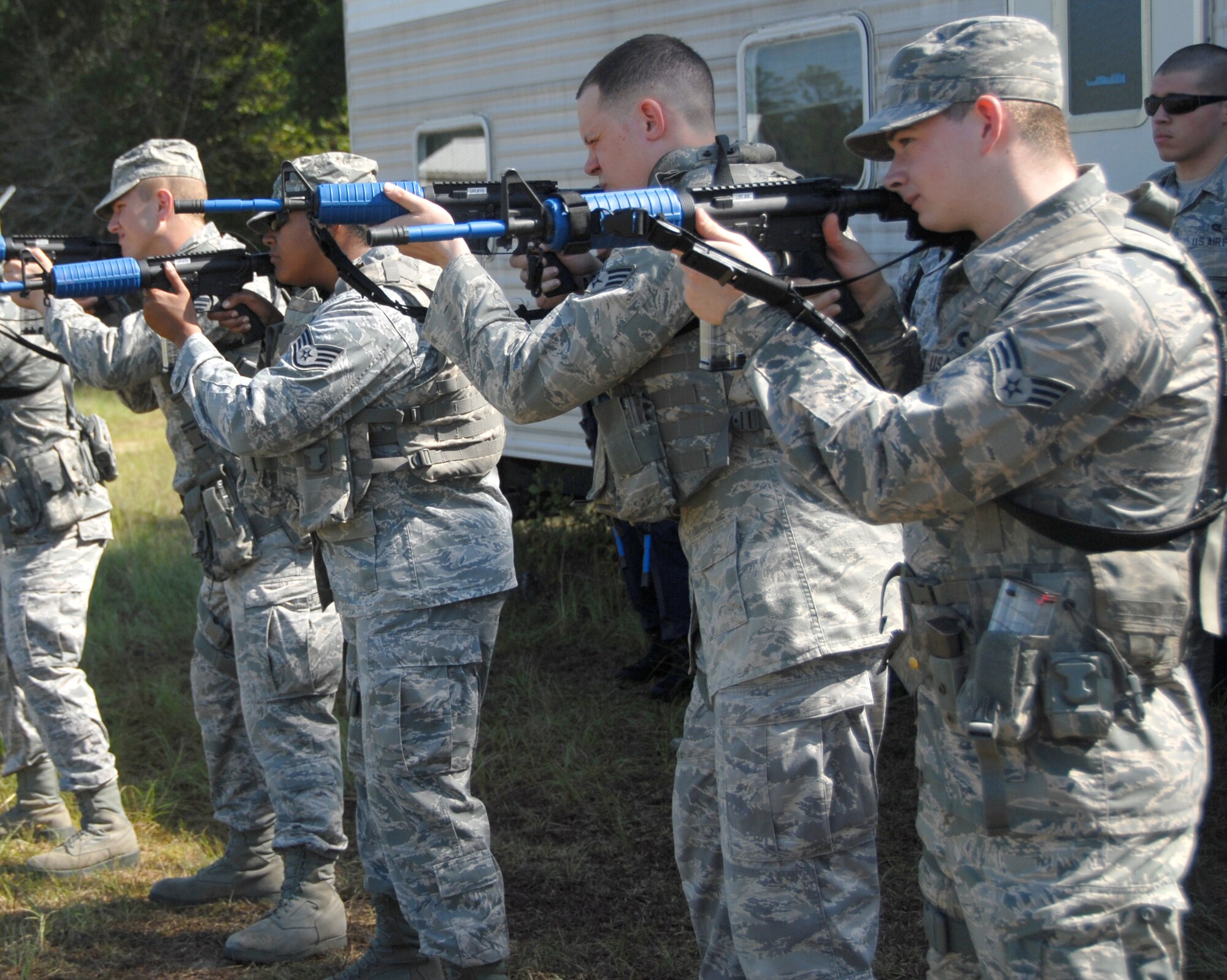 Seventy Eighth Security Forces Squadron Airmen conducted Shoot, Move and Communicate, and Combatives training at the EOD Range and fitness center annex respectively Aug. 19 and 21, 2014. During the SMC training, Airmen hone their skills on how to react. Participants go over different firing positions, fighting stances, maneuvers and communications while targeting the enemy.

Combatives training includes self defense, weapons retention, hand-to-hand combat, submission holds and non-lethal techniques and strikes. The two-part training starts in the morning with intense warm-ups and stretching, followed by basic fighting techniques, including a light sparring session with a partner to recap all of the techniques taught as it applies in use-of-force regulations. (U.S. Air Force photo by Misuzu Allen )

