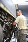 Master Sgt. James Delgros, an aerospace propulsion journeyman with the 910th Maintenance Squadron, works on a C-130H Hercules aircraft engine during an isochronal inspection here, Aug.25. Each Youngstown C-130 undergoes an isochronal inspection every 540 days. 910th Maintainers now perform the inspections using a new, $1.5 million dock stand system designed to increase efficiency and safety for workers. YARS is the first installation in Air Force Reserve Command to acquire the system beyond its prototype phase. U.S. Air Force photo/Eric M. White.