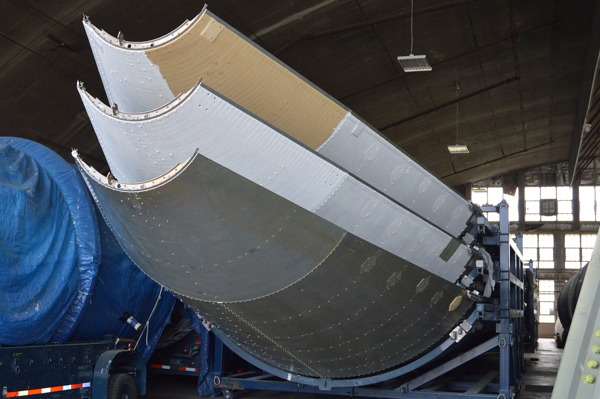 DAYTON, Ohio -- The Titan IVB space launch vehicle in the restoration hangar at the National Museum of the United States Air Force. These are sections of the payload fairings. (U.S. Air Force photo)
