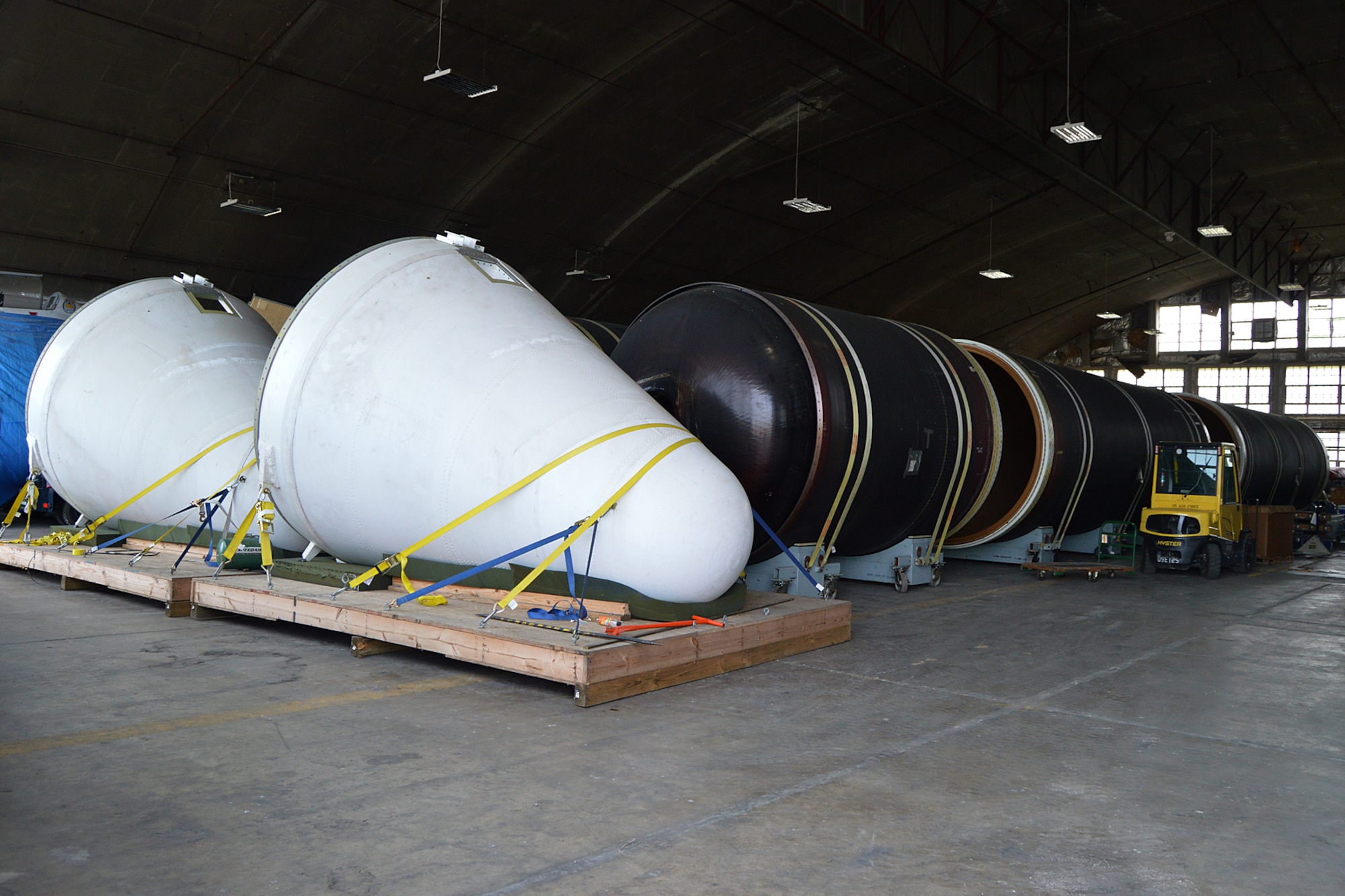 DAYTON, Ohio -- The Titan IVB space launch vehicle in the restoration hangar at the National Museum of the United States Air Force. These are the solid rocket motor units and nose cones. (U.S. Air Force photo)
