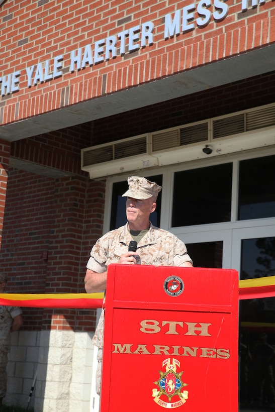 MARINE CORPS BASE CAMP LEJEUNE, N.C. – Col. Kenneth M. DeTreux, the commanding officer of 8th Marine Regiment and native of Philadelphia, Penn., gives a speech honoring Cpl. Johnathan T. Yale and Lance Cpl. Jordan C. Haerter during a ceremony to rename Wallace Creek Dining Hall in their honor Aug. 28, 2014, aboard Marine Corps Base Camp Lejeune, N.C. Yale and Haerter died protecting their fellow Marines in Iraq when they engaged and stopped a truck loaded with 2,000 pounds of explosives before it reached its intended target in April 2008. Both Marines were posthumously awarded the Navy Cross for heroism. (Marine Corps photo by Lance Cpl. Michelle M. Mohn)