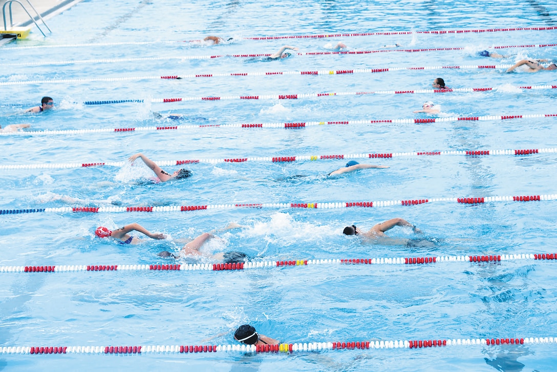 Competitors swim their way through a 400-yard zigzag course in the Quantico 50M Pool as part of the Quantico Tri on Marine Corps Base Quantico on Sunday. The youngest competitor was 10 years old; the oldest was 75 years young.