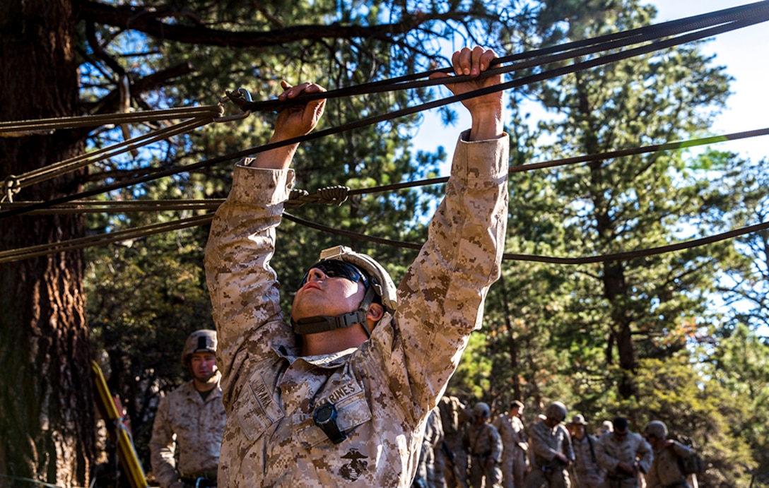 U.S. Marine Sgt. Jose Uranga tests the tension of the ropes while training to build and cross rope bridges during Mountain Exercise 2014 aboard Marine Corps Mountain Warfare Training Center in Bridgeport, Calif., Aug. 27, 2014. Uranga is a platoon sergeant with 2nd Platoon, India Company, 3rd Battalion, 1st Marine Regiment. Marines with 3rd Battalion, 1st Marine Regiment will become the 15th Marine Expeditionary Unit’s ground combat element in October. Mountain Exercise 2014 develops critical skills the battalion will need during deployment.