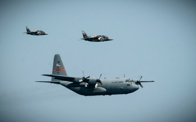 A C-130 Hercules from the 182nd Airlift Wing, Peoria, Ill., is being escorted by Canadian Alpha Jets during Operation Northern Strike 2014 near Rogers City, Mich., on Aug. 7, 2014. Operation Northern Strike 2014 is a joint multinational combined arms training exercise conducted in Michigan. (U.S. Air National Guard photo by Master Sgt. Scott Thompson)