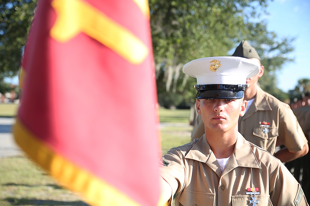 Pfc. Madison M. Leitner, honor graduate of platoon 1056, awaits graduation at Marine Corps Recruit Depot Parris Island, S.C., Aug. 29, 2014. Leitner, a Lexington, S.C. native, was recruited by Staff Sgt. Bryan T. Davis, a recruiter from Marine Corps Recruiting Sub Station Lexington, Recruiting Station Columbia. Recruit training signifies the transformation of a civilian to a United States Marine. Upon graduation, the newly-minted Marines will receive ten days of leave before attending the School of Infantry East, Camp Gieger, N.C. The Marines will be trained in basic infantry skills to ensure Marines are combat-ready. (Official Marine Corps photo by Lance Cpl. John-Paul Imbody)