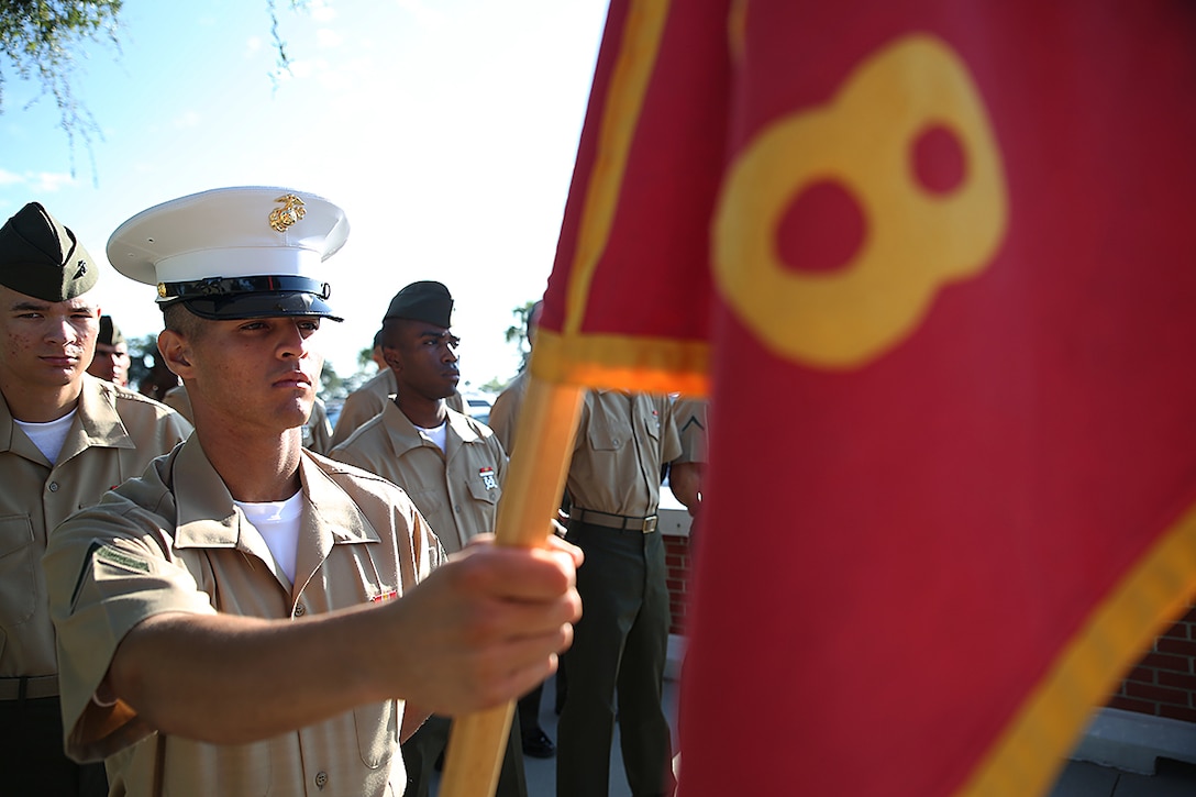 Pfc. Reynaldo Nunez Jr., honor graduate of platoon 1058, awaits graduation at Marine Corps Recruit Depot Parris Island, S.C., Aug. 29, 2014. Nunez Jr., a Kissimmee, Fla. native, was recruited by Sgt. Jose B. Bello, a recruiter from Recruiting Sub Station Kissimmee, Recruiting Station Orlando. Recruit training signifies the transformation of a civilian to a United States Marine. Upon graduation, the newly-minted Marines will receive ten days of leave before attending the School of Infantry East, Camp Gieger, N.C. The Marines will be trained in basic infantry skills to ensure Marines are combat-ready. (Official Marine Corps photo by Lance Cpl. John-Paul Imbody)