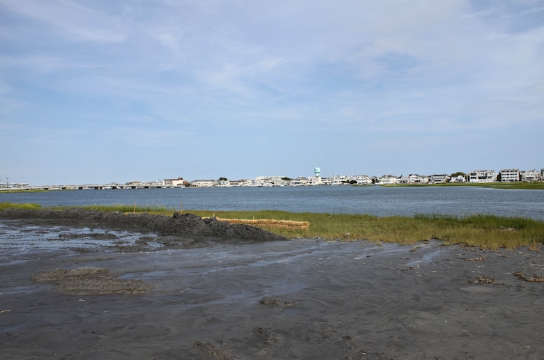 The U.S. Army Corps of Engineers and its contractor are restoring marsh on Ring Island near Stone Harbor, N.J. as part of a demonstration project. USACE and its contractor are dredging the New Jersey Intracoastal Waterway and beneficially using the material to restore marsh land and critical ecological habitat owned and managed by the state of New Jersey Division of Fish & Wildlife.  