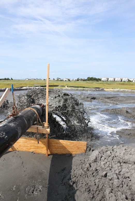 The U.S. Army Corps of Engineers and its contractor are restoring marsh on Ring Island near Stone Harbor, N.J. as part of a demonstration project. USACE and its contractor are dredging the New Jersey Intracoastal Waterway and beneficially using the material to restore marsh land and critical ecological habitat owned and managed by the state of New Jersey Division of Fish & Wildlife.