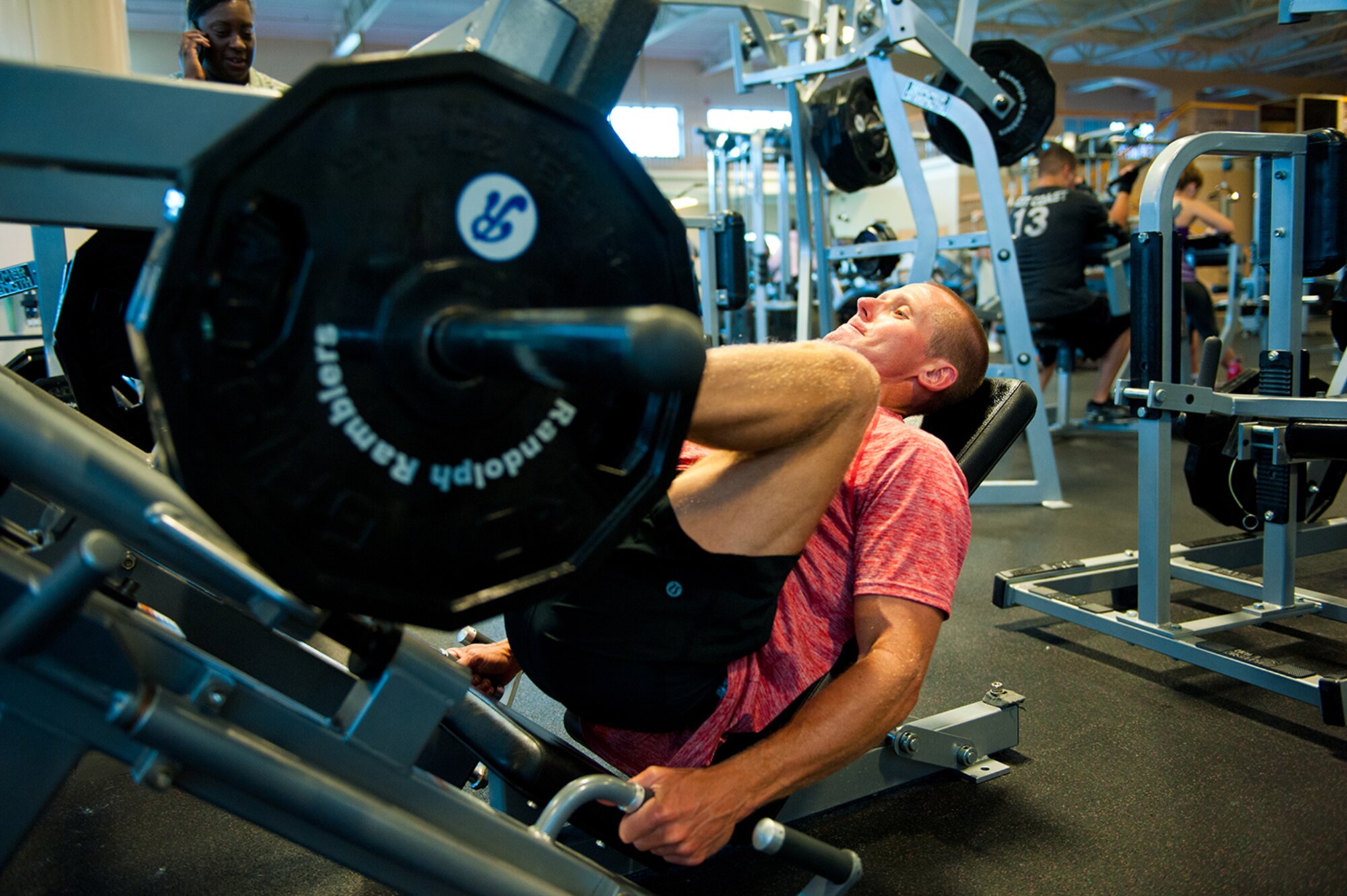 U.S. Air Force Lt. Col. Stephen Frank, instructor pilot, 559 Flying Training Squadron, performs leg press to build up his quads and lower muscle groups, 16 July, 2014, Joint Base San Antonio-Randolph, Texas. (U.S. Air Force photo by Tech. Sgt. Sarayuth Pinthong/ Released)