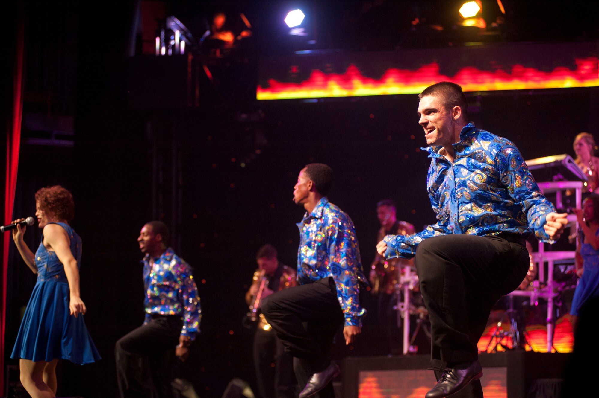 Tops in Blue performed at the Memorial Auditorium in Wichita Falls, Texas Aug. 28. 2014. The unit primarily performs for military personnel and their families, but has also been known to perform for the civilian population as well. The group performed music and entertainment stemming from a variety of popular culture with an Air Force twist. (U.S. Air Force photos by Airman 1st Class Jelani Gibson)