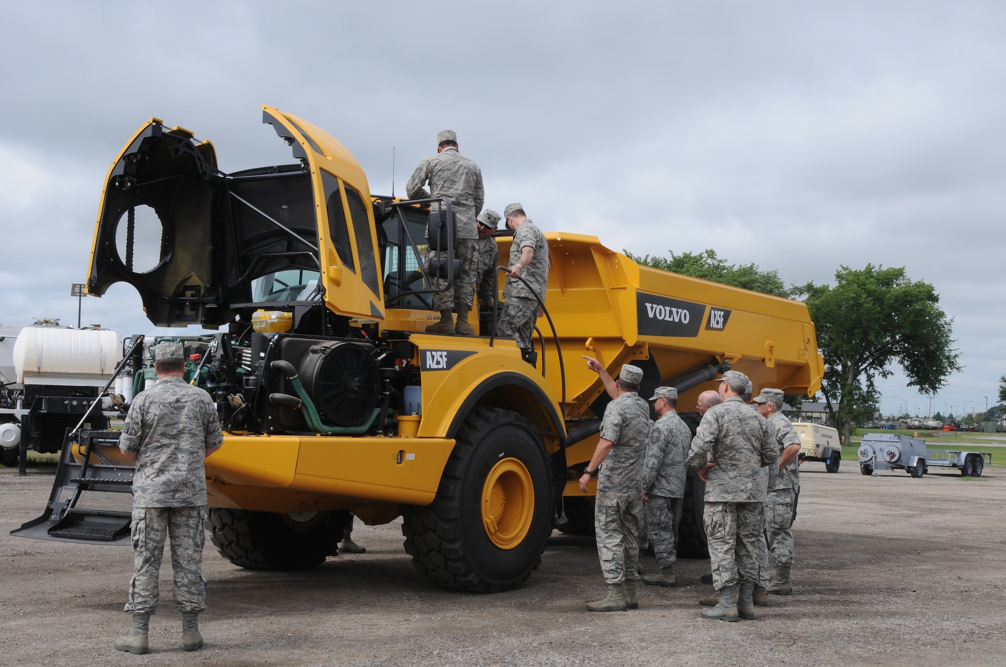 Members of the 188th Wing check out a Volvo 25-ton rock dump truck at Ebbing Air National Guard Base, Fort Smith, Arkansas. The vehicle’s capabilities were showcased during a tour of the 188th Civil Engineering Squadron Rapid Engineer Deployable Heavy Operational Repair Squadron Engineer (REDHORSE) Training Center. The 188th Wing has the Air National Guard’s first and only REDHORSE training center. (U.S. Air National Guard photo by Airman 1st Class Cody Martin/released)