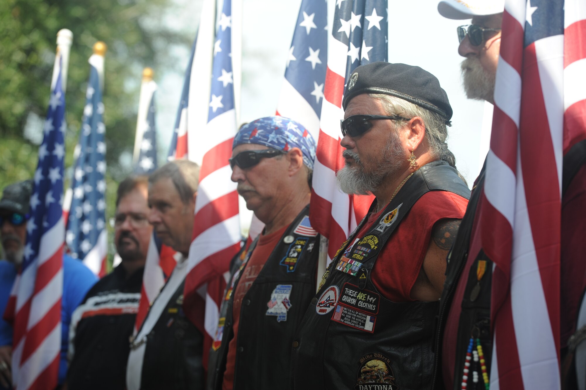 Cat Aguda and fellow members of the Combat Vet Motorcycle Association attend a Forgotten Hero ceremony for Maj. Pierre David Junod Aug. 28, 2014, at Biloxi National Cemetery. Keesler personnel, members of the American Patriot Riders, and parishioners of the Nourishing Place chapel attended the ceremony to honor Junod, who had no remaining family. Junod was a U.S. Air Force navigator during the Vietnam War. (U.S. Air Force photo by Airman 1st Class Stephan Coleman)