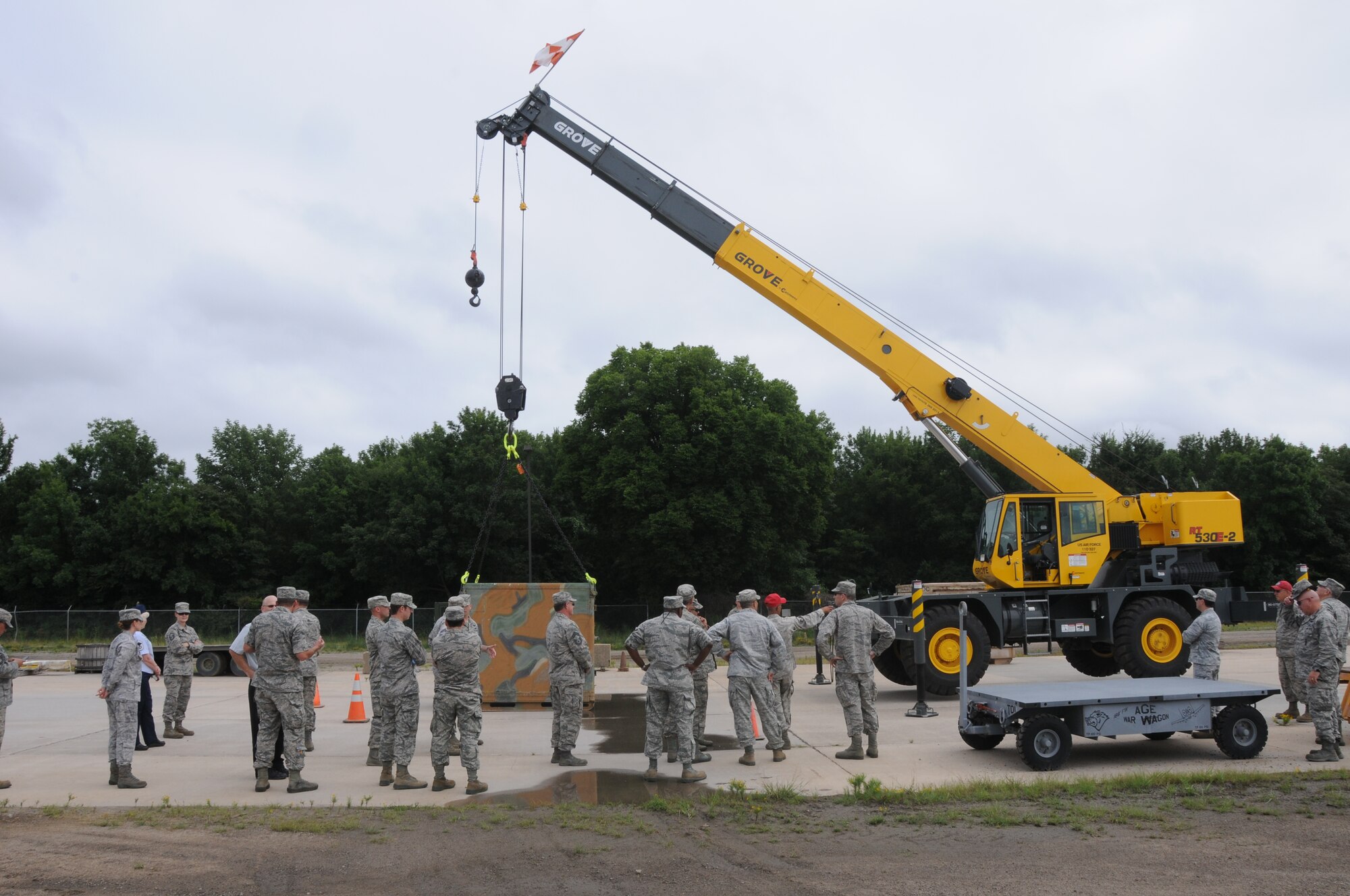 Members of the 188th Wing observe operation of the Grove 30-ton rough terrain mobile crane at Ebbing Air National Guard Base, Fort Smith, Arkansas. The crane’s capabilities were showcased during a tour of the 188th Civil Engineering Squadron Rapid Engineer Deployable Heavy Operational Repair Squadron Engineer (REDHORSE) Training Center. The 188th has the Air National Guard’s first and only REDHORSE training center. (U.S. Air National Guard photo by Airman 1st Class Cody Martin/released)