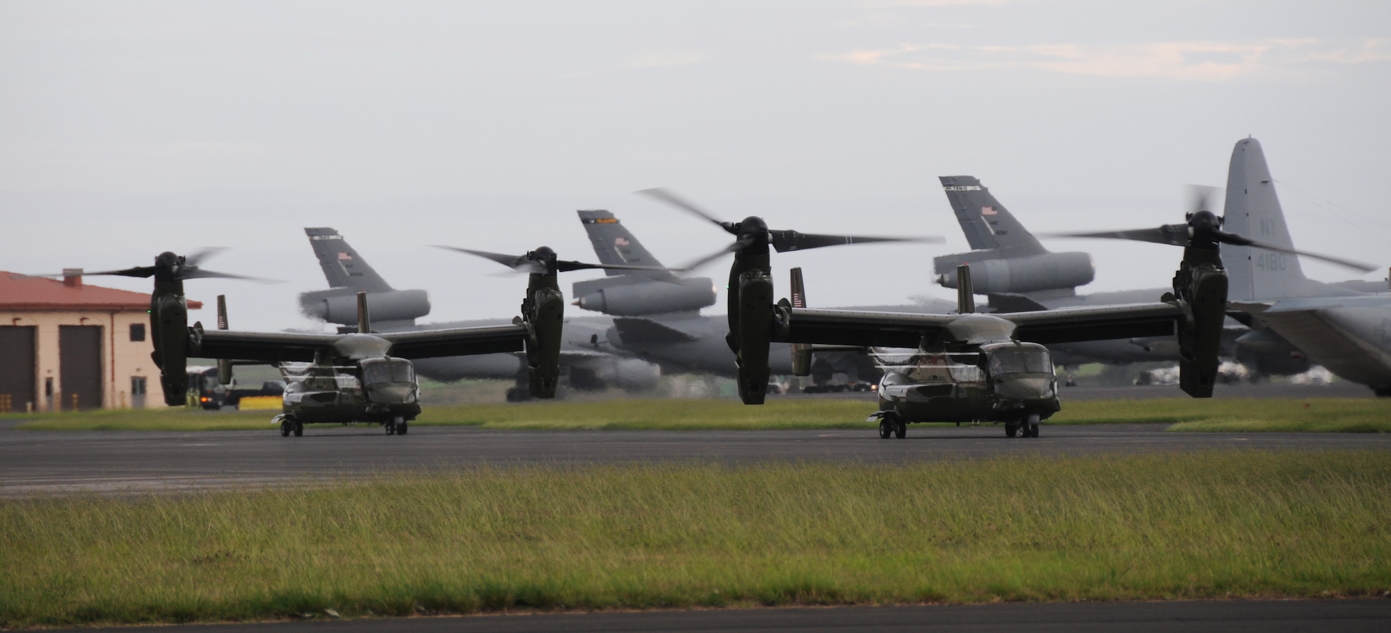 Two Marine Corps MV-22B Ospreys arrive Aug. 26, 2014, Lajes Field, Azores, Portugal. The MV-22Bs are assigned to Marine Helicopter Squadron One, Marine Corps Base Quantico, Va. The MV-22Bs and Marines assigned to HMX-1 provide Presidential and VIP support in addition to their primary role as the Operational Test and Evaluation unit for Marine assault support helicopters and related equipment. (U.S. Air Force Photo by 1st Lt. Korey Fratini/Released)