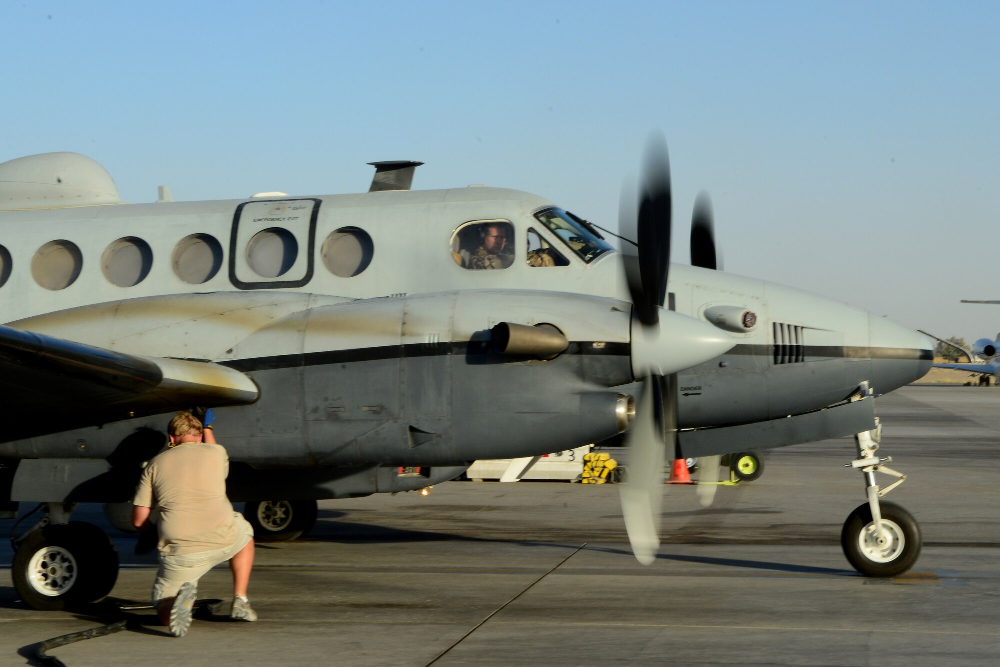 An MC-12W Liberty aircraft with the 361st Expeditionary Reconnaissance Squadron prepares to take off for a mission at Kandahar Airfield, Afghanistan Aug. 20,2014.  After four years of intelligence, surveillance and reconnaissance operations the unit will end its mission in September.  (U.S. Air Force photo by Staff Sgt. Evelyn Chavez/Released)