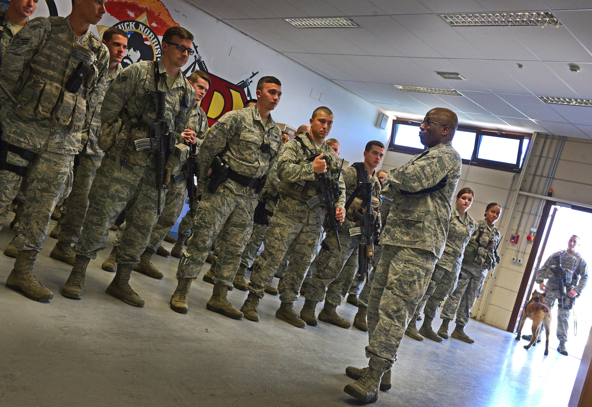 Brig. Gen. Allen Jamerson, Director of Security Forces, Deputy Chief of Staff for Logistics, Installations and Mission Support, Headquarters U.S. Air Force, Washington, D.C., visits Airmen at the 31st Security Forces Squadron’s armory, Aug. 29, 2014, at Aviano Air Base, Italy. Jamerson who arrived Wednesday, visited with Aviano’s defenders at their workplace to learn more about their job and answer any questions they had. (U.S. Air Force photo/Senior Airman Matthew Lotz)