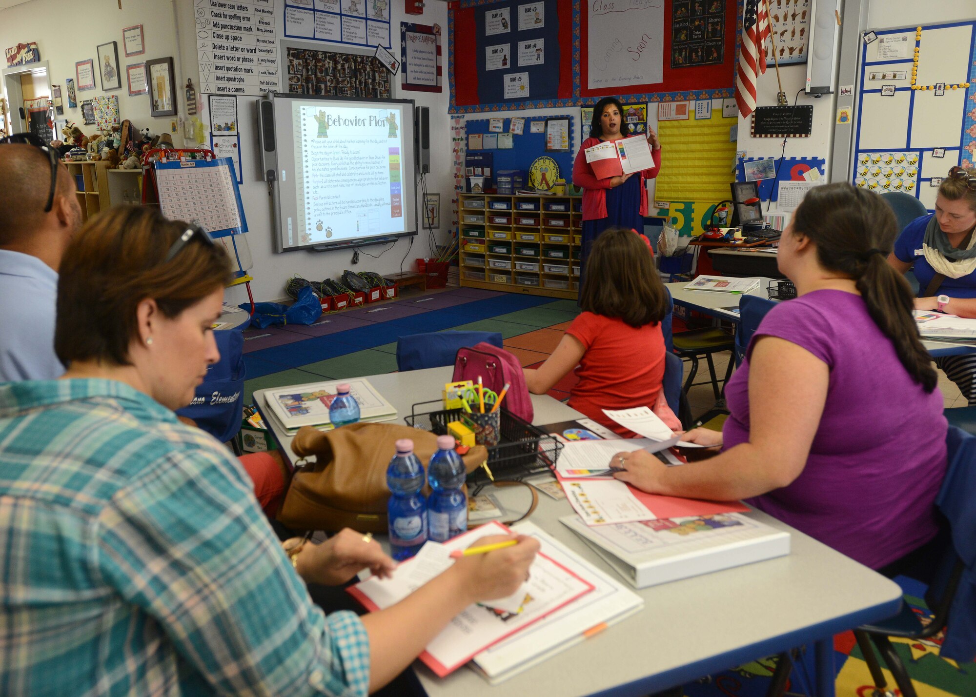 Janyne Roers, Department of Defense Education Activity elementary teacher, briefs the parents of her 2nd grades class during the “Back to School Bash,” Aug. 28, 2014, at Aviano Air Base, Italy. The bash gave parents the opportunity to meet their child’s teacher and learn more about the school district. (U.S. Air Force photo/Airman 1st Class Deana Heitzman)