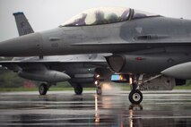 F-16 Fighting Falcons from Kunsan Air Base taxi to the runway during Exercise Buddy Wing 14-8 at Seosan Air Base, Republic of Korea, Aug. 21, 2014. The purpose of the exercise was not only to improve interoperability between U.S. Air Force and ROKAF fighter squadrons, but to practice with ROKAF KF-16 units for their first upcoming RED FLAG exercise in Alaska. (U.S. Air Force photo by Senior Airman Taylor Curry/Released)