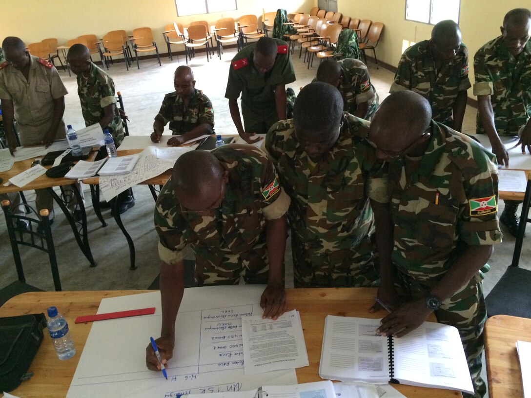 Burundian Army intelligence officers practice the fundamentals of map-reading, terrain building, and using basic intelligence concepts during a three-week Basic Intelligence Course in Bujumbura, Burundi, November 3rd -21st. The U.S. Africa Command sponsored, Marine Forces Africa-led engagement is designed to enhance the host nation’s contribution to the African Union Mission to Somalia, which the Burundi Army has supported since 2007. 