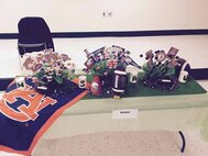 In addition to the food, was a football themed table decoration contest in which sections decorated tables in hopes of winning the most creative and best designed table decorations.  The winner this year was Marine Security Augmentation Unit (MSAU) with their Alabama-Auburn rivalry themed decorations.