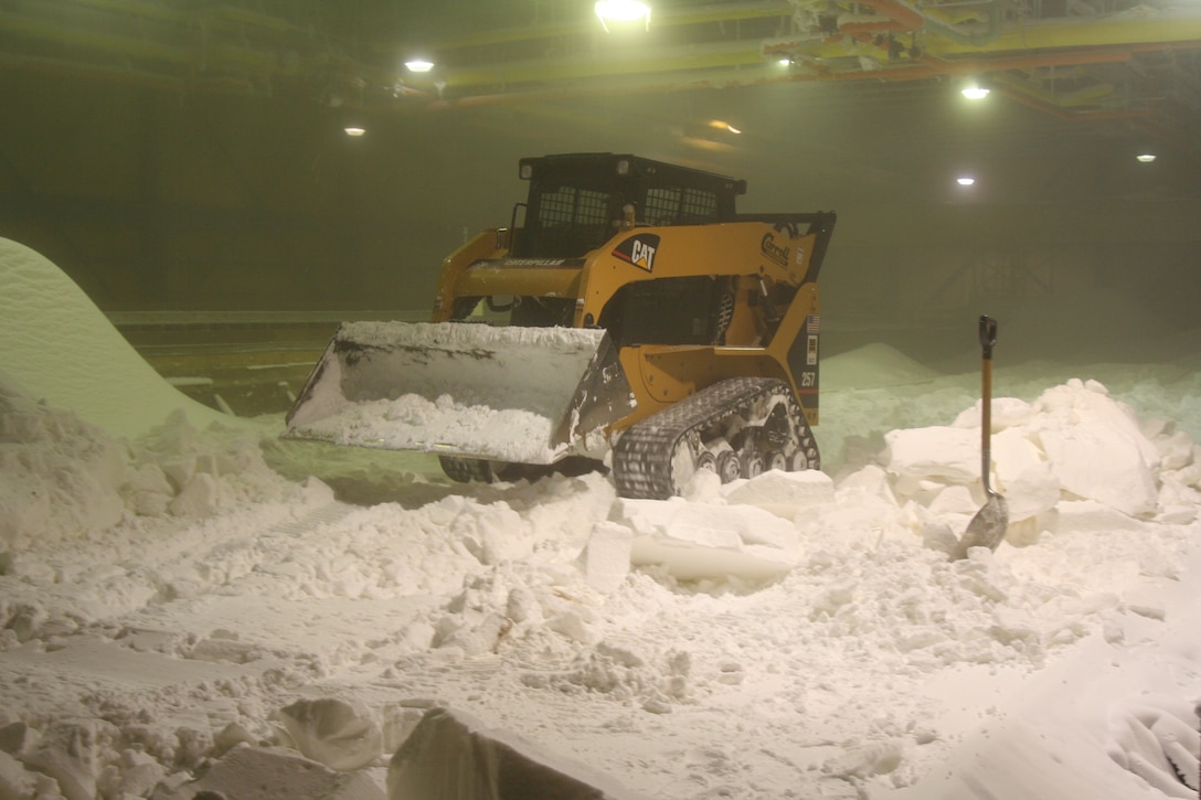 CRREL’s Engineering Resources Branch prepares the Research Area for a mobility study involving snow.