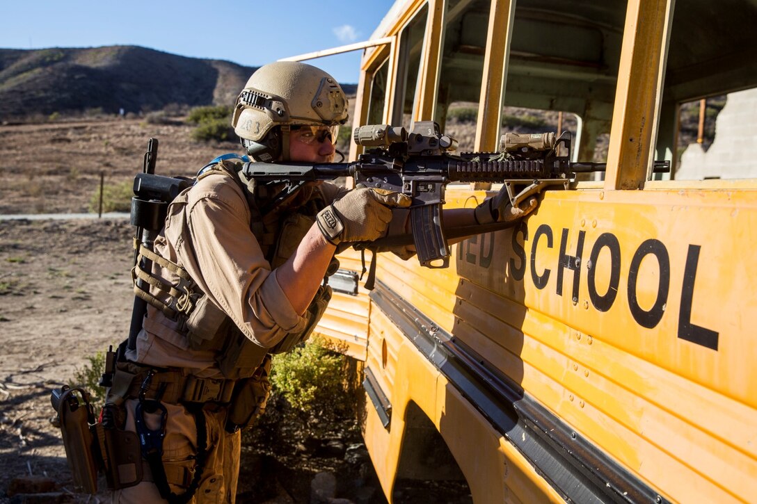 U.S. Marine Sgt. Zack Ray posts security during interoperability training aboard Camp Pendleton, Calif., Nov. 20, 2014. Ray is a point man with the 15th Marine Expeditionary Unit’s Maritime Raid Force. Interop gives the 15th MEU’s MRF and Security Element an opportunity to work together and support each other in preparation for a deployment in the spring. (U.S. Marine Corps photo by Cpl. Anna Albrecht/Released)
