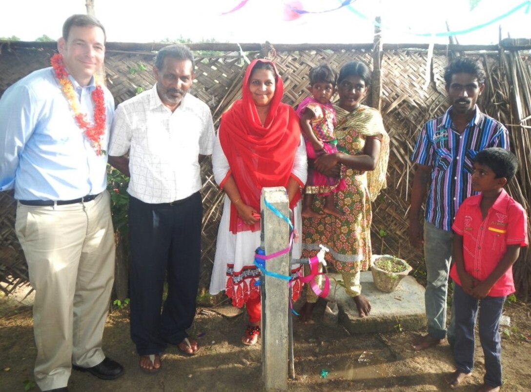 On Oct.28, a handover ceremony was conducted for a water supply project that will benefit an estimated 4,000 to 8,000 residents in Puttalam, Sri Lanka. The project provided the necessary labor, pipe, meters and faucets to link 427 households to the city water line. The recipient families were living below the country’s poverty level and unable to purchase a connection for themselves. The easy access now eliminates the hardship of walking three to five kilometers for clean water. U.S. Government representatives in attendance included Teresa Tellechea, political affairs officer for the U.S. Embassy; Mike Reed and Joe Parfitt of the Civil Military Support Element; and Mike MacMillan (left in picture), project manager for the Alaska District. Also present were K.A. Baiz, mayor of Puttalam, numerous local officials and about 200 beneficiaries from the community. 