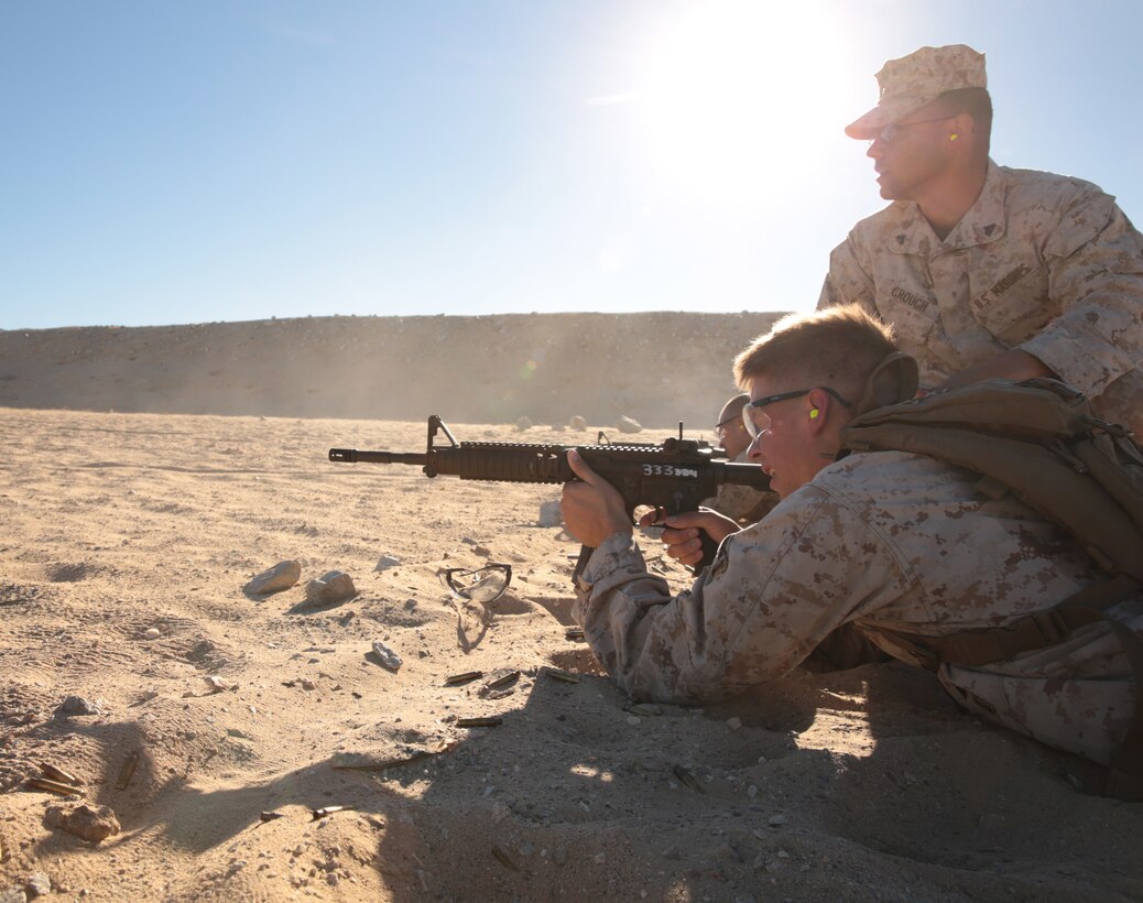 A Marine with 3rd Light Armor Reconnaissance Battalion, takes part in conduct the marksmanship event of the 3rd LAR field meet aboard the Combat Center, Nov. 20, 2014. 3rd LAR tries to conduct training that incorporates basic combat skills in events like the field meet. (Official Marine Corps photo by Pfc. Medina Ayala-Lo/Released)