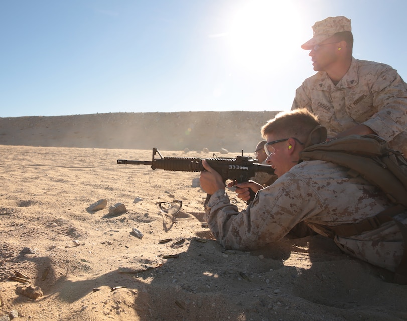 A Marine with 3rd Light Armor Reconnaissance Battalion, takes part in conduct the marksmanship event of the 3rd LAR field meet aboard the Combat Center, Nov. 20, 2014. 3rd LAR tries to conduct training that incorporates basic combat skills in events like the field meet. (Official Marine Corps photo by Pfc. Medina Ayala-Lo/Released)
