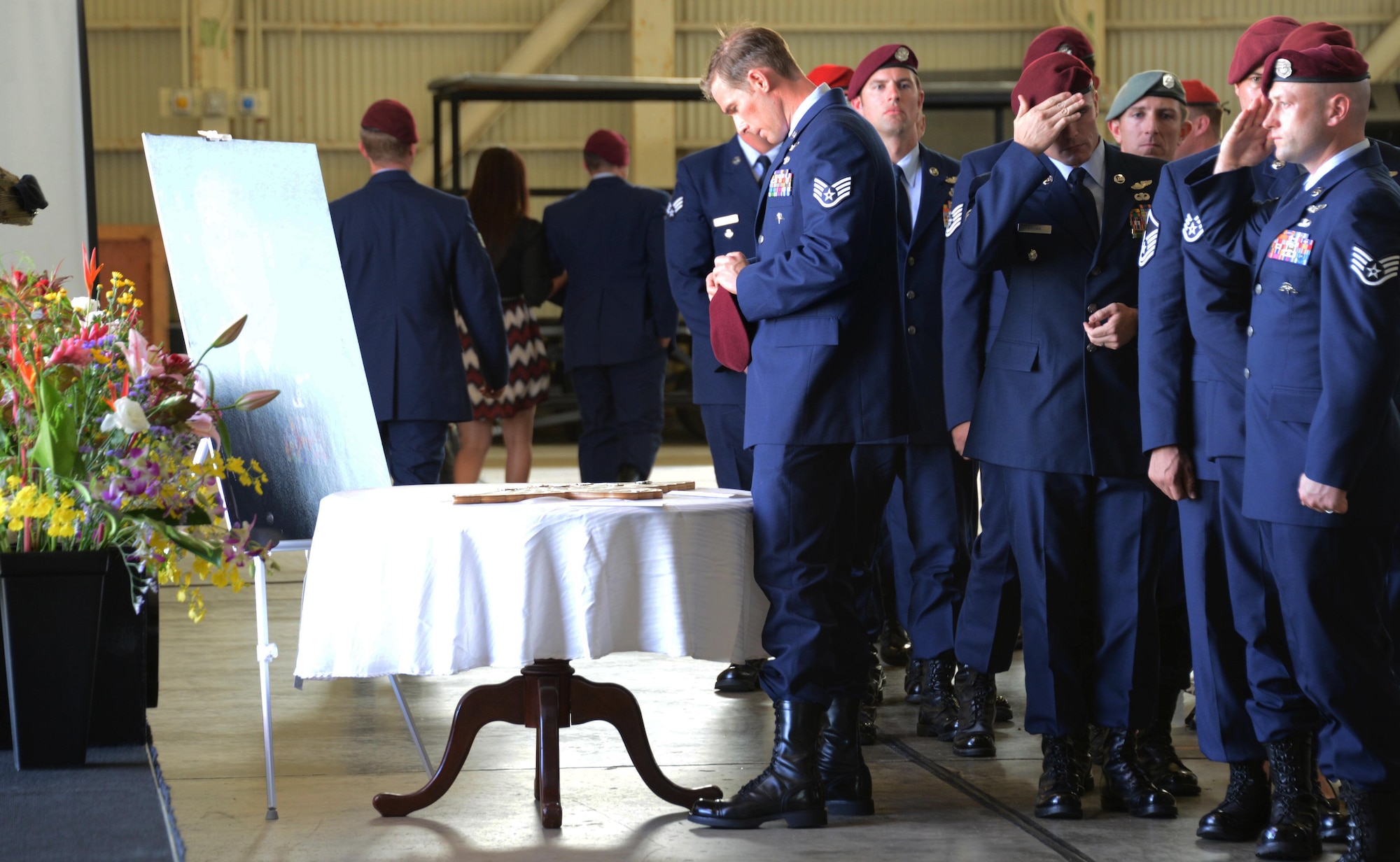 Members from Tech. Sgt. Sean Barton’s team pay their respects at a memorial ceremony held Nov. 25, 2014 at Kadena Air Base, Japan.  Barton, a 320th Special Tactics Squadron pararescueman, died Oct. 30 from injuries sustained after a rappelling incident during a joint exercise training event near Kathmandu, Nepal.  (U.S. Air Force photo by Tech. Sgt. Kristine Dreyer)
 
