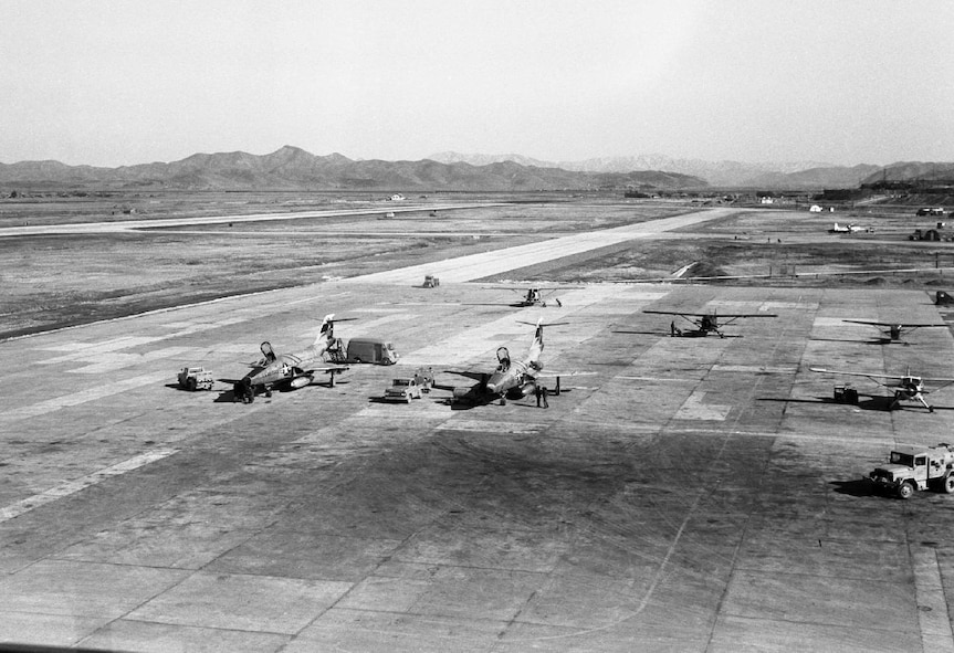 Two RF-101 jets and four L-20 jets sit on the flight line on Osan Air Base, Republic of Korea. (Courtesy photo by Mac Hayes)