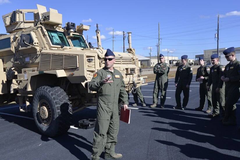 Master Sgt. Seth Malcolm, 16th Airlift Squadron Training Superintendent, reviews vital loading information about the RG-33 vehicle with 16th AS Airmen Dec. 1, 2014, at the Army Strategic Logistics Activity on Joint Base Charleston, S.C. Members of the 16th AS were being briefed on the types of equipment they could be transporting during their next deployment. (U.S. Air Force photo/Eric Sesit)