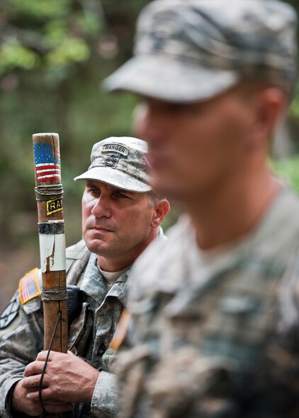 Soldiers from the 6th Ranger Training Battalion, stand by the memorial for the four fallen Rangers who lost their lives Feb. 16, 1995. More than 40 Soldiers participated in the excursion Sept. 25 that followed in the footsteps of the tragic squad to learn from their experience and understand what took place that night almost 20 years ago on the Eglin Air Force Base range.