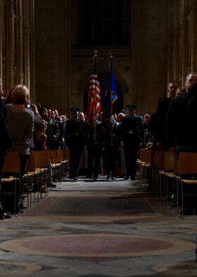 Team Mildenhall Honor Guard members present the colors during the Thanksgiving Eve service Nov. 26, 2014, at Ely Cathedral, England. The cathedral was built by William the Conqueror as a prominent outpost after the bloody and lengthy rebellion by Hereward the Wake. (U.S. Air Force photo by Senior Airman Victoria H. Taylor/Released)
