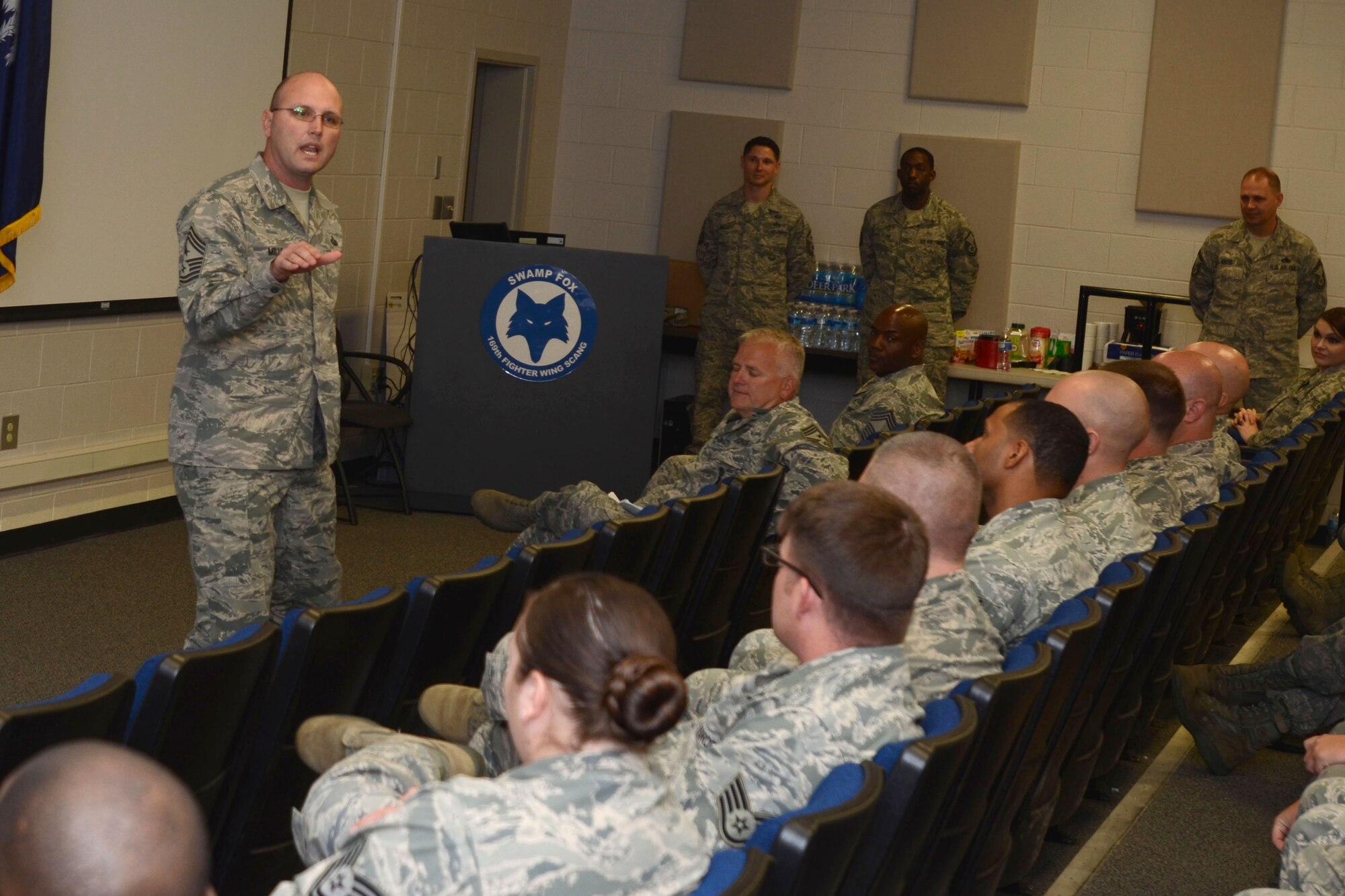 U.S. Air Force Chief Master Sgt. Charles Mills, the 20th Fighter Wing Command Chief, speaks to attendees of McEntire Joint National Guard Base's first Non-Commissioned Officer Professional Enhancement Seminar (NCOPES) with a goal of reemphasizing supervisory roles of junior NCOs assigned to the South Carolina Air National Guard's 169th Fighter Wing and the 20th Fighter Wing from Shaw Air Force Base, S.C., Oct. 28, 2014. (U.S. Air National Guard photo by Senior Master Sgt. Edward Snyder/Released)