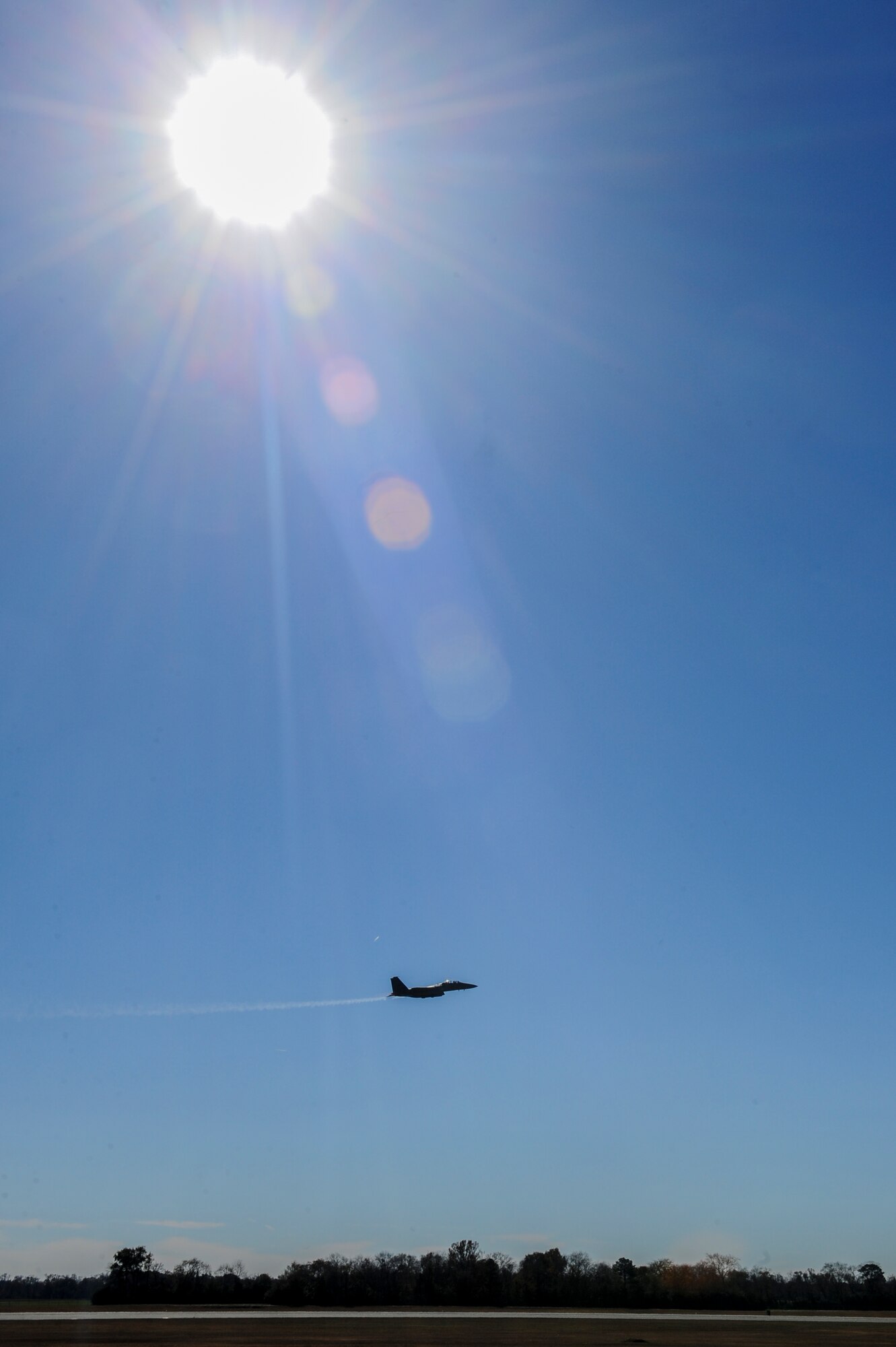 An F-15E Strike Eagle takes off during exercise Coronet Warrior 14-03 at Seymour Johnson Air Force Base, North Carolina, Nov. 20, 2014. Coronet Warrior tested Airmen on their response to different scenarios to prepare them for contingency operations in deployed environments. (U.S. Air Force photo/Airman 1st Class Brittain Crolley) 