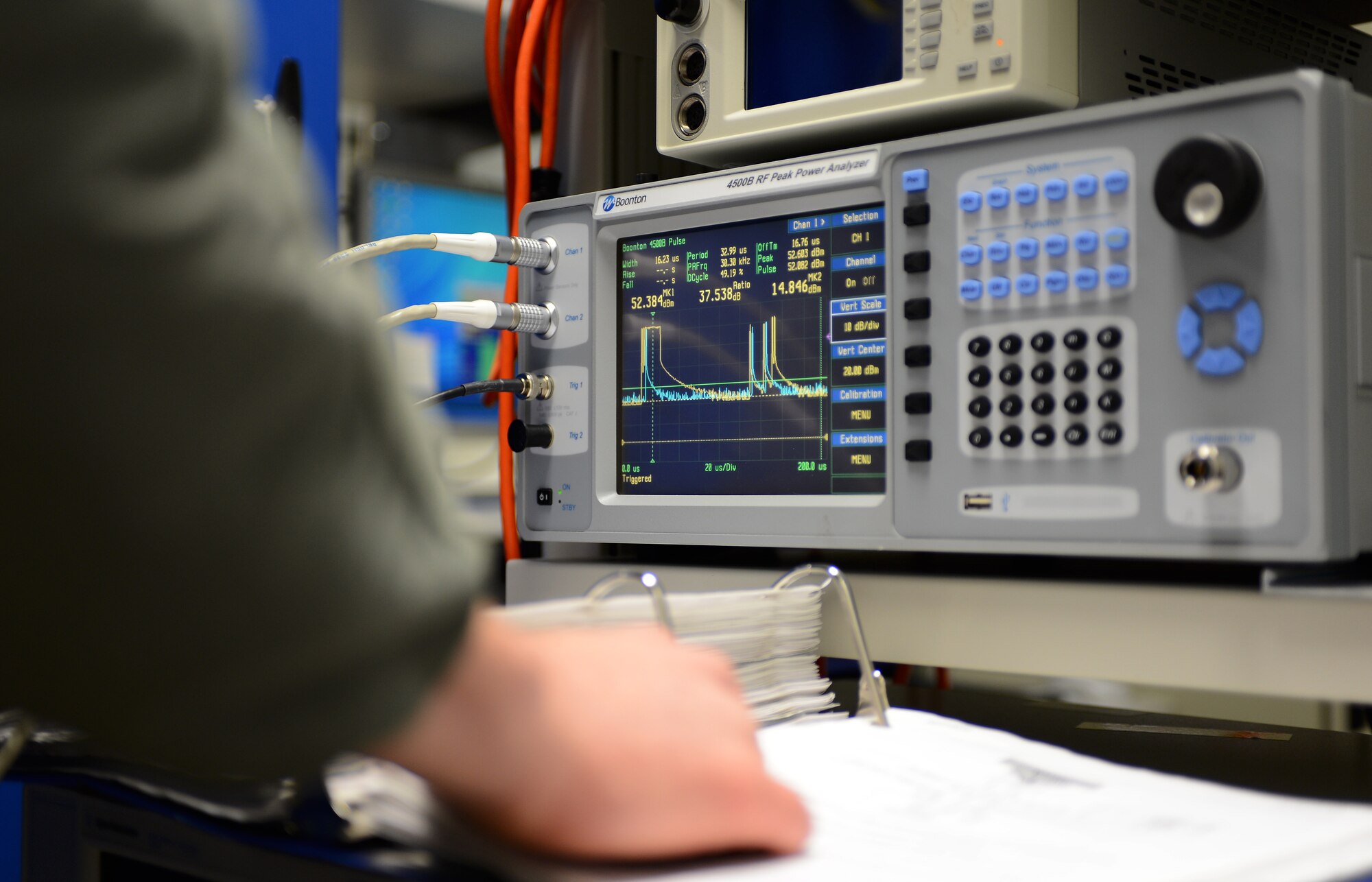 An Airman from the 52nd Operations Support Squadron monitors incoming information from a Digital Airport Surveillance Radar at Spangdahlem Air Base, Germany, Nov. 25, 2014.  Airmen perform routine checks on the radar monitor to ensure it is working properly and providing accurate data. (U.S. Air Force photo by Airman 1st Class Luke Kitterman/Released)