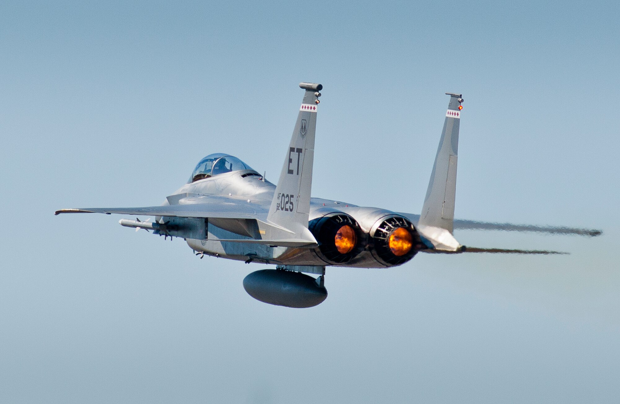 A 40th Flight Test Squadron F-15 Eagle soars after completing a fly by on the Duke Field runway during a morning sortie.  The 40th FTS Airmen fly operational test missions in the F-16, F-15 and A-10. The 40th FTS is a squadron in the 96th Test Wing. (U.S. Air Force photo/Samuel King Jr.)