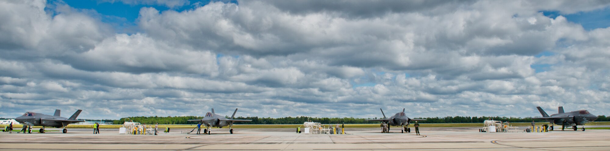 F-35 Lightning II variants fill the 33rd Fighter Wing’s hot pit refueling area on Eglin Air Force Base, Fla.   All of the F-35 variants use the refueling areas in conjunction with the 96th Logistics Readiness Squadron’s fuels flight. (U.S. Air Force photo/Samuel King Jr.)  