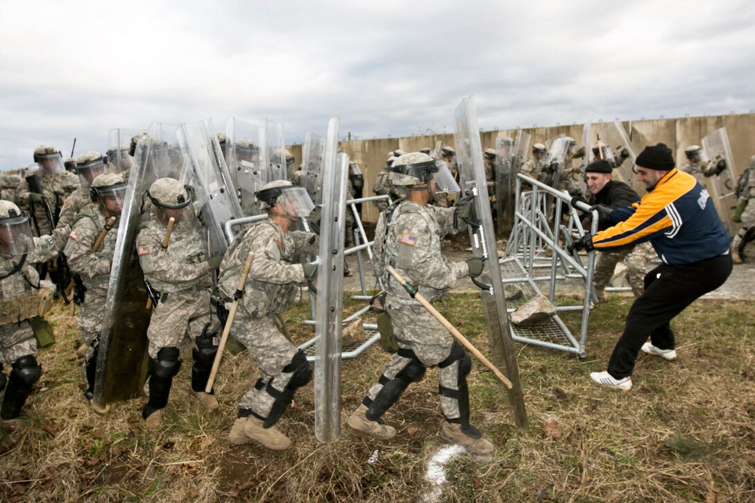 U.S. Army soldiers conduct riot-control training during exercise Silver Sabre on Camp Vrelo, Kosovo, Nov. 20, 2014. 