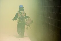 Marines and Sailors of the Chemical Biological Incident Response Force, II Marine Expeditionary Force, conduct a live chemical agent exercise at Fort A.P. Hill, Virginia on April 10. The unit conducted simulated casualty extraction in clouds of CS gas to prepare for real life evacuation situations. In order to execute its mission, CBIRF possesses a wide variety of unique skill sets that are task organized to address all possible aspects of a CBRNE attack. CBIRF has six major sections organic to the battalion: Explosive Ordnance Disposal, Technical Search and Rescue, Decontamination, Medical, Identification and Detection, and Search and Rescue/Casualty Extraction. (Official Marine Corps Photo by Sgt Kuande L. Hall/Released)


