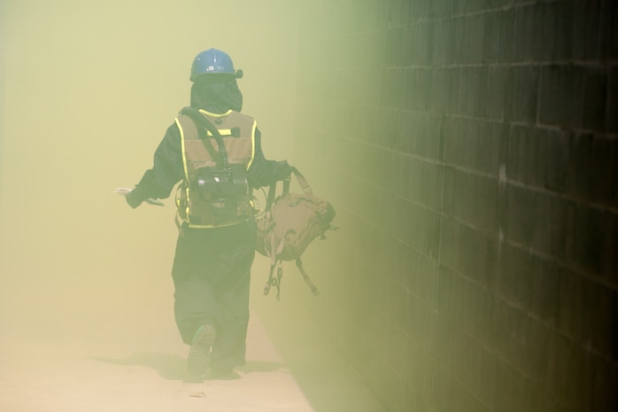 Marines and Sailors of the Chemical Biological Incident Response Force, II Marine Expeditionary Force, conduct a live chemical agent exercise at Fort A.P. Hill, Virginia on April 10. The unit conducted simulated casualty extraction in clouds of CS gas to prepare for real life evacuation situations. In order to execute its mission, CBIRF possesses a wide variety of unique skill sets that are task organized to address all possible aspects of a CBRNE attack. CBIRF has six major sections organic to the battalion: Explosive Ordnance Disposal, Technical Search and Rescue, Decontamination, Medical, Identification and Detection, and Search and Rescue/Casualty Extraction. (Official Marine Corps Photo by Sgt Kuande L. Hall/Released)


