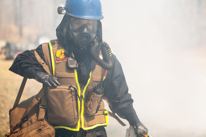 Marines and Sailors of the Chemical Biological Incident Response Force, II Marine Expeditionary Force, conduct a live chemical agent exercise at Fort A.P. Hill, Virginia on April 10. The unit conducted simulated casualty extraction in clouds of CS gas to prepare for real life evacuation situations. In order to execute its mission, CBIRF possesses a wide variety of unique skill sets that are task organized to address all possible aspects of a CBRNE attack. CBIRF has six major sections organic to the battalion: Explosive Ordnance Disposal, Technical Search and Rescue, Decontamination, Medical, Identification and Detection, and Search and Rescue/Casualty Extraction. (Official Marine Corps Photo by Sgt Kuande L. Hall/Released)


